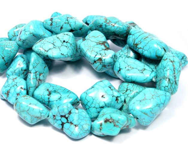 سنگ هالیت رنگ شده به شکل فیروزه که گاهی در بازار به نام فیروزه آمریکایی، چینی و... به فروش می رسد